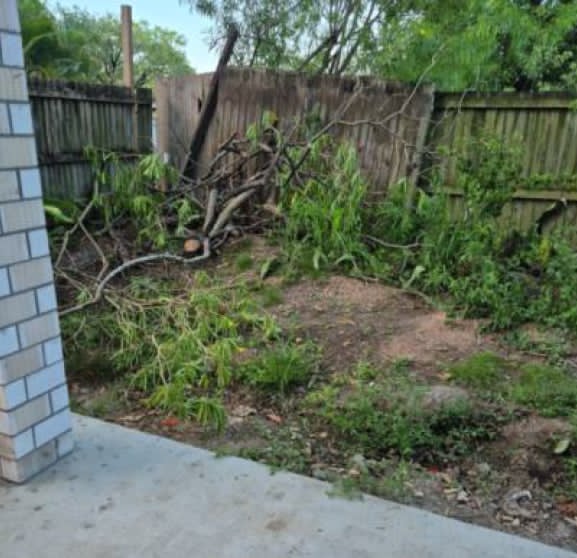Untamed rear yard at the Newmarket property before the outdoor living project
